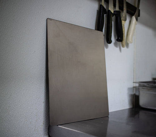 Real Titanium Cutting Board Used in Restaurant Frontal